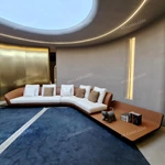 Modern Curved Luxury Sectional Sofa Collection with Integrated Display Side Table, Premium Leather & Fabric Upholstery
